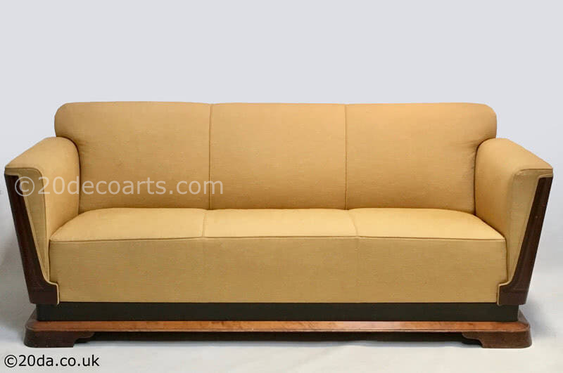  20th Century Decorative Arts |Beautiful Elegant French Art Deco Sofa Wrap around wooden sides and skirt in a rich veneer with simple line inlay circa 1930s 