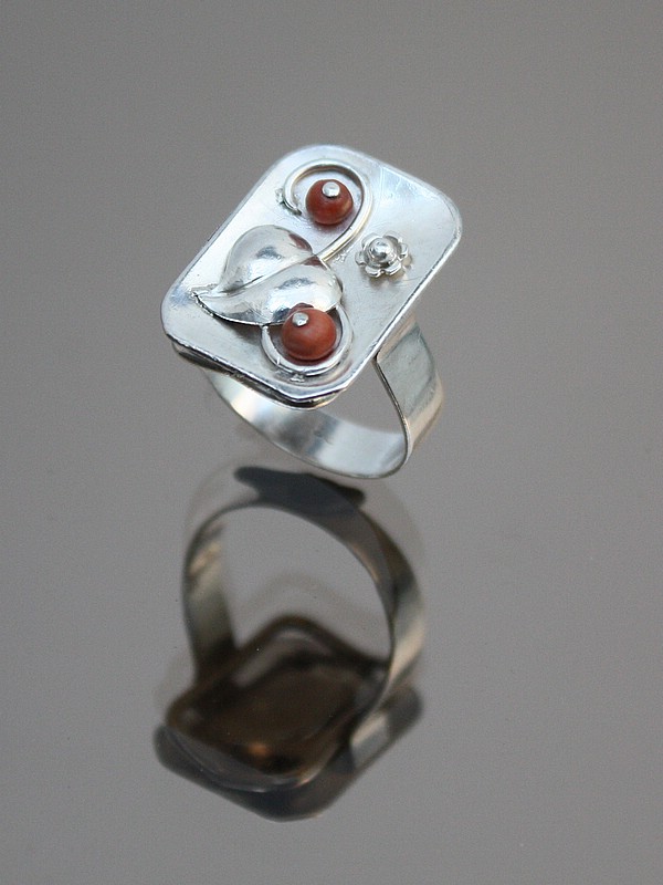 20th Century Decorative Arts | An Art Deco 835 silver and coral ring attributed to Louis Vausch,  Berlin, Germany circa 1930.