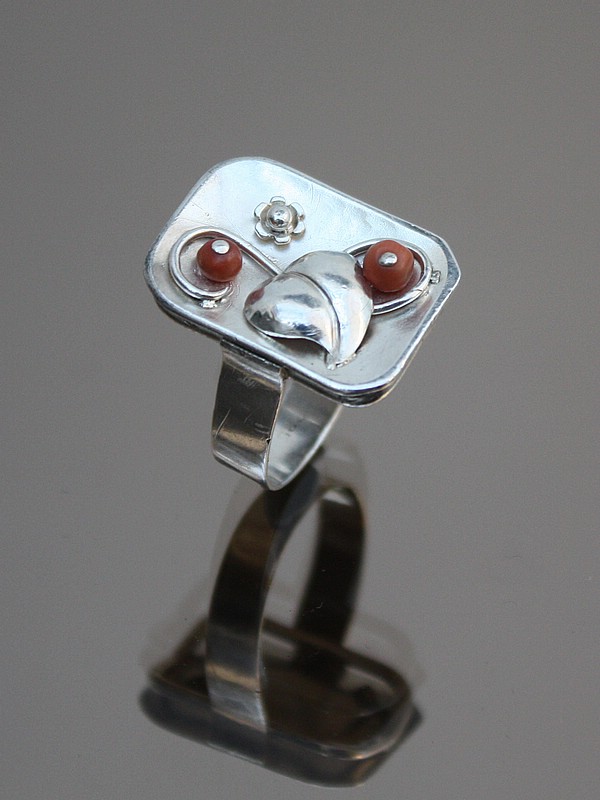 20th Century Decorative Arts | An Art Deco 835 silver and coral ring attributed to Louis Vausch,  Berlin, Germany circa 1930.