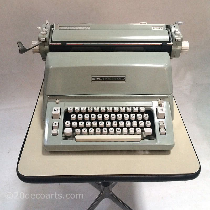  20th Century Decorative Arts |Hermes Ambassador Typewriter with original cover in excellent condition c1960's.