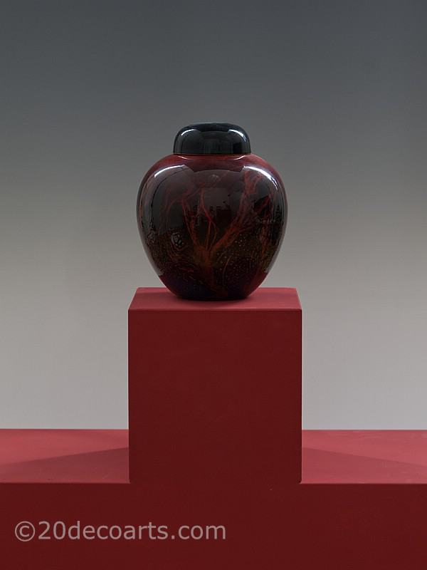  20th Century Decorative Arts |A Royal Doulton Flambe Sung ginger jar attributed to Fred Moore, circa 1935, the pottery body with a high fired flambe glaze featuring shades of red, blue and purple