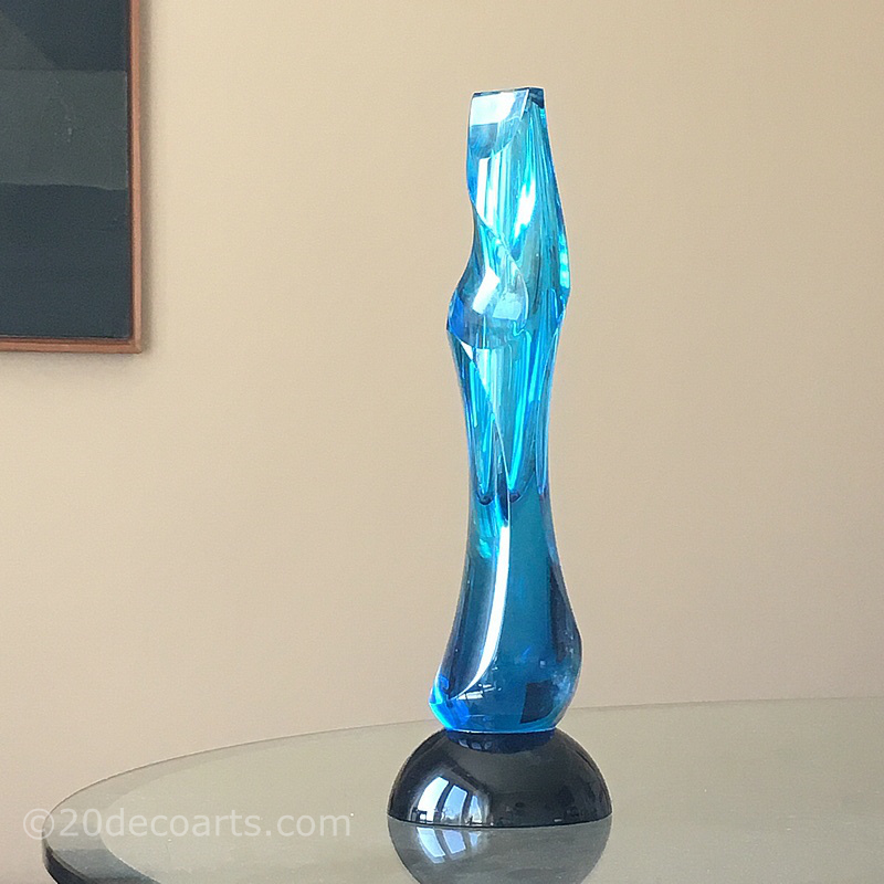 Eduard Soukup (b. 1974) - A sculpted cut vase, the tall stem in light blue cased glass carved to create an asymmetrical abstract form  
