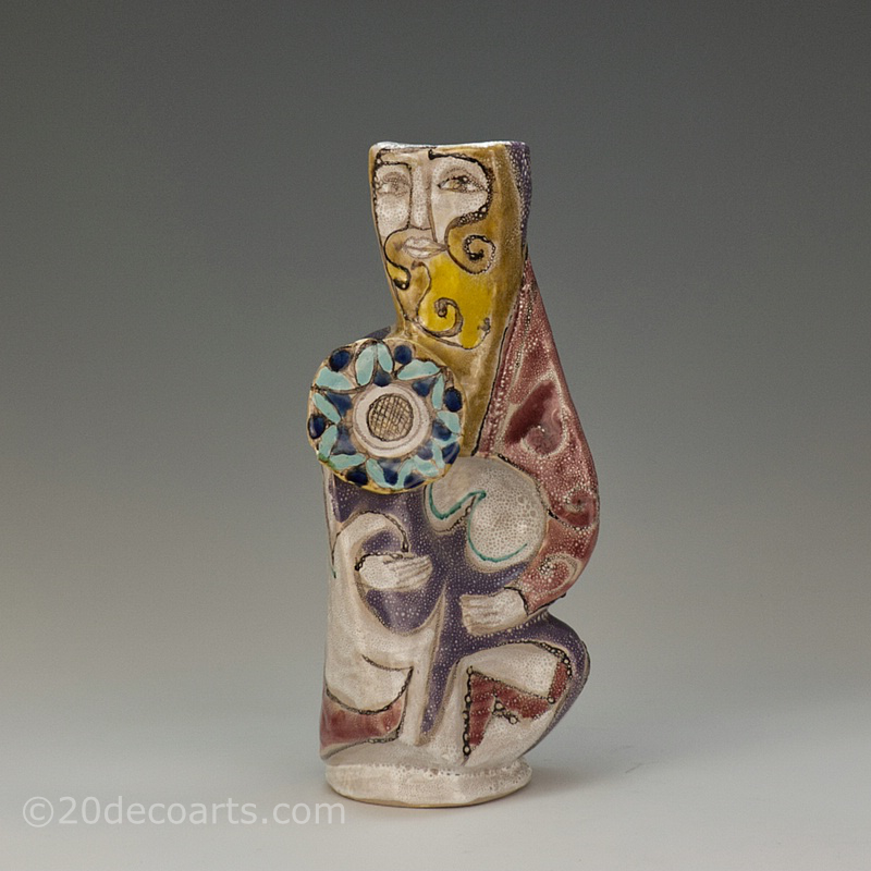  20th Century Decorative Arts |A large Elio Schiavon hi-glaze figurative sculptural ceramic vase, "Guerriero", Italy circa 1960, the body decorated in enamels with applied disc
