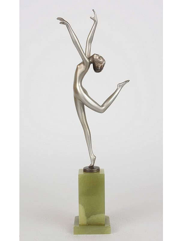  20th Century Decorative Arts |A stylish Art Deco Austrian bronze figure by Josef Lorenzl "Arabesque", circa 1930s depicting a dancer with a silver cold-painted and enamelled finish, mounted on a green onyx base