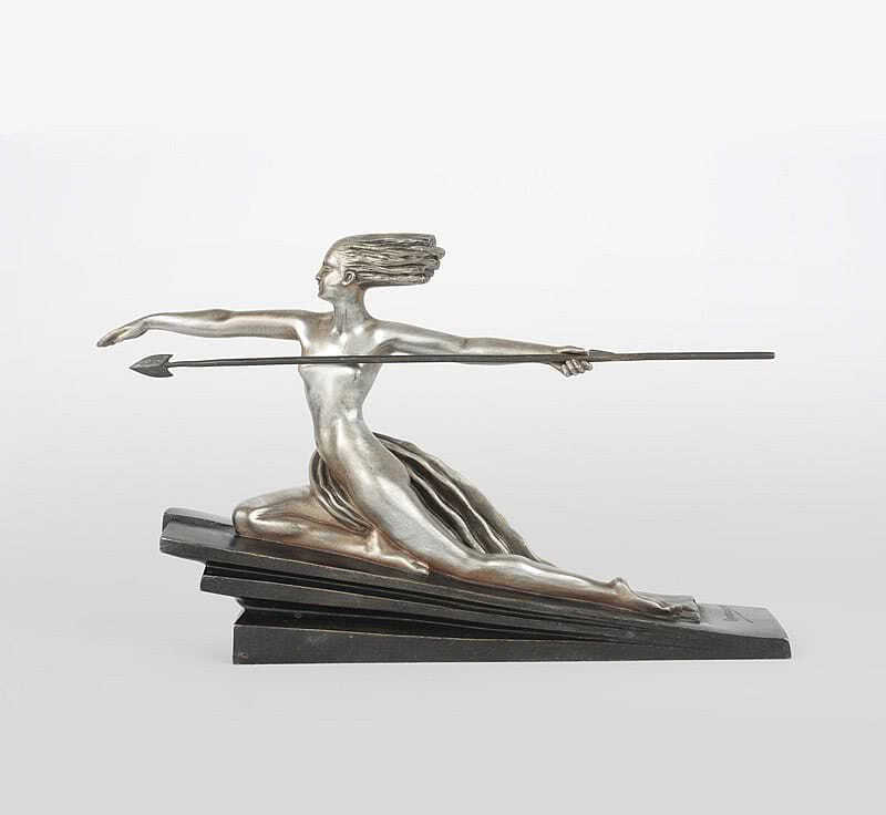  20th Century Decorative Arts |The rare "Amazon" Art Deco French bronze figure by Marcel-Andre Bouraine, circa 1920's, edited by Edmund Etling modelled as a huntress and with her spear, raised on stepped bronze base, the bronze silvered and patinated, with her original spear