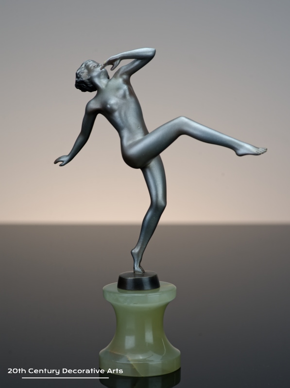  Josef Lorenzl - An Art Deco bronze figure circa 1930 - depicting a high kicking young woman
